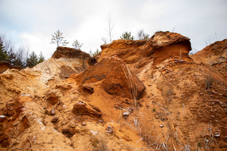 Textural sand, with a relief surface, multi-colored layers and different in size of granules, in an...