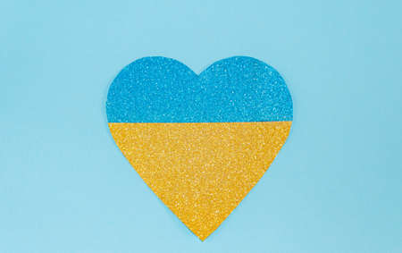 The brilliant heart of blue and yellow color, symbol of the Ukrainian flag. Concept of peace and love in Ukraine.の写真素材