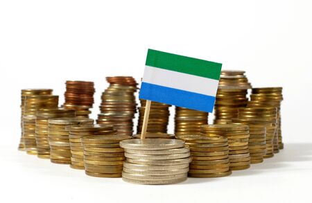 Sierra Leone flag waving with stack of money coinsの写真素材