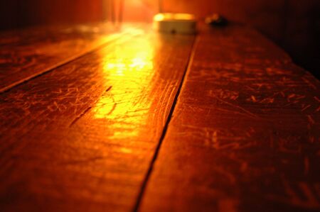 reflection of lamp on desktopの写真素材