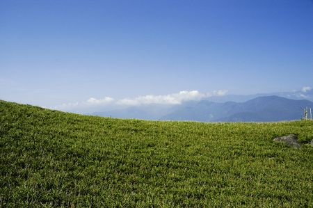 grasslands  and sky cloudsの写真素材