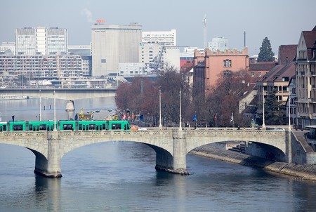 Basel City, Switzerland, March 17th 2010: Rein River with bridge and tramのeditorial素材