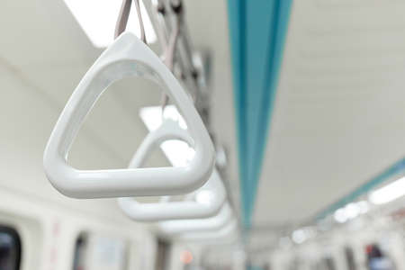 handle grip on train close upの写真素材