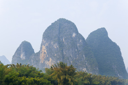 Li River scenery sight with fog in spring, Guilin, Chinaの写真素材
