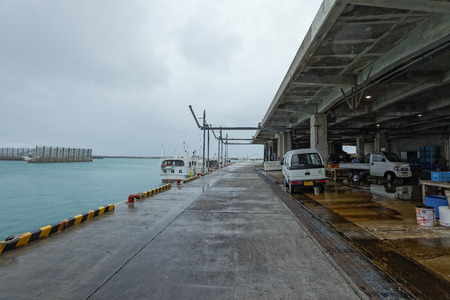 Ishigaki,Japan,December,17th,2013, Ishigaki fishing port and fishing shipsのeditorial素材