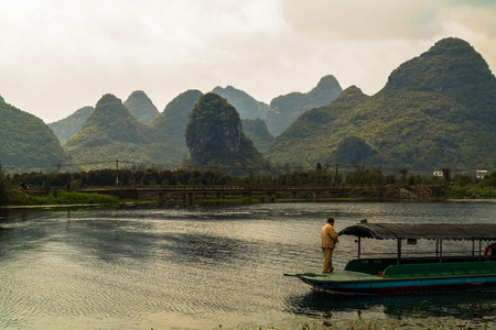 Guilin ,China, March,24th,2014, ferrier on river, the Fairyland Park , famous tourism scenic area, Yangshuo Town, Guilin  ,Chinaのeditorial素材