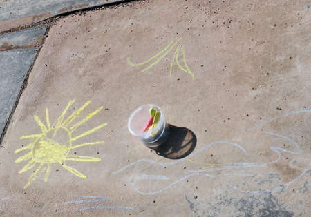 Children drawing with chalkの写真素材
