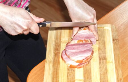 Precursors pork meat, preparing burgers. Woman cookの写真素材