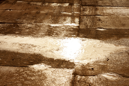The texture of the mud or wet soil.Road to build a house
