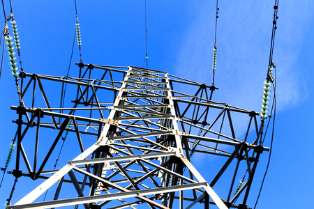Power transmission line on high voltage post.