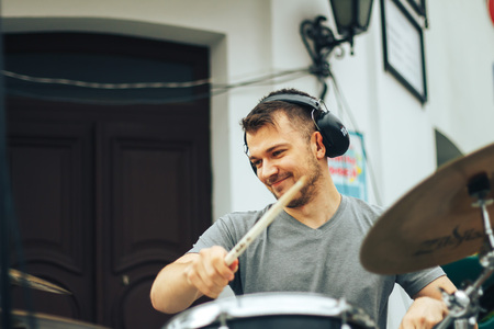 MINSK, BELARUS.JULY 29 2017 A street muscian playing drums