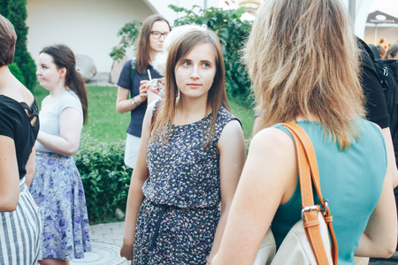 MINSK, BELARUS.JULY 29, 2017 People watching the performance on the streetのeditorial素材