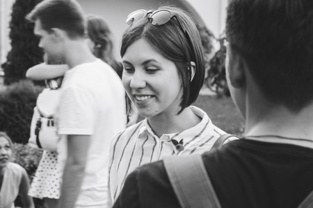 MINSK, BELARUS.JULY 29, 2017 People watching the performance on the streetのeditorial素材
