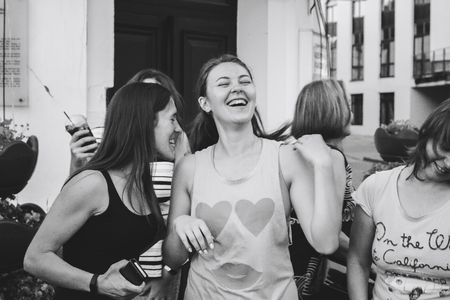 MINSK, BELARUS.JULY 29, 2017. Group of people laughing and posing in front of cameraのeditorial素材