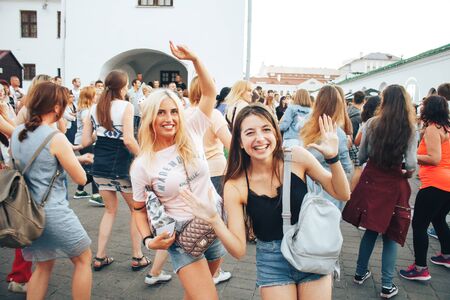 MINSK, BELARUS.JULY 29, 2017. Group of people laughing and posing in front of cameraのeditorial素材