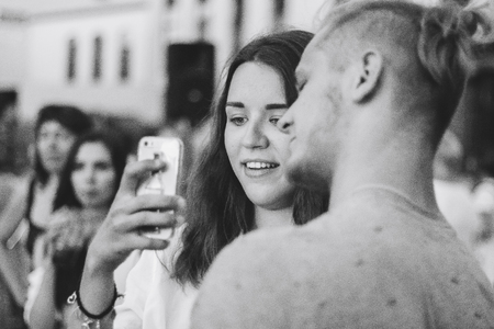 MINSK, BELARUS.JULY 29, 2017 People watching the performance on the streetのeditorial素材