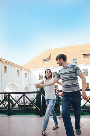 MINSK, BELARUS.August 12, 2017 Couples dancing outdoors on the streetのeditorial素材