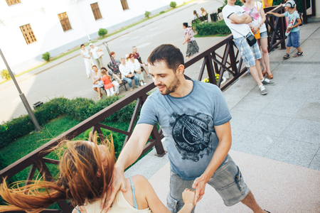 MINSK, BELARUS.August 12, 2017 Couples dancing outdoors on the streetのeditorial素材