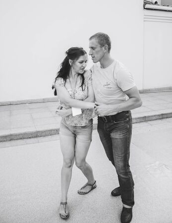 MINSK, BELARUS.August 12, 2017 Couples dancing outdoors on the streetのeditorial素材