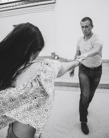 MINSK, BELARUS.August 12, 2017 Couples dancing outdoors on the street
