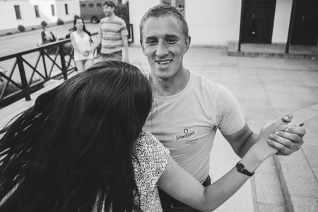MINSK, BELARUS.August 12, 2017 Couples dancing outdoors on the streetのeditorial素材