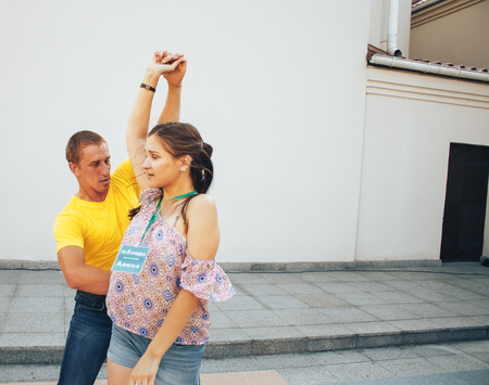 MINSK, BELARUS.August 12, 2017 Couples dancing outdoors on the streetのeditorial素材