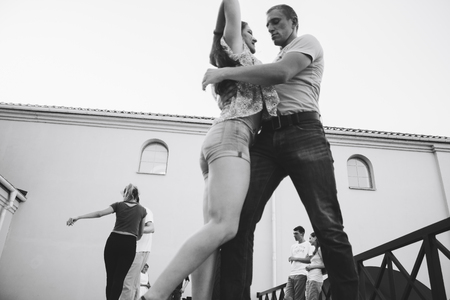 MINSK, BELARUS.August 12, 2017 Couples dancing outdoors on the streetのeditorial素材