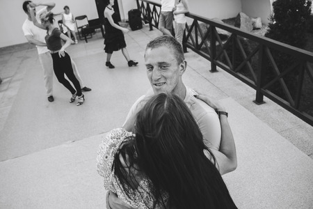 MINSK, BELARUS.August 12, 2017 Couples dancing outdoors on the street