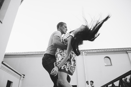 MINSK, BELARUS.August 12, 2017 Couples dancing outdoors on the streetのeditorial素材