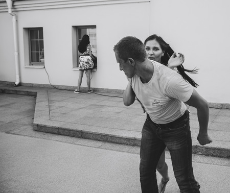 MINSK, BELARUS.August 12, 2017 Couples dancing outdoors on the streetのeditorial素材
