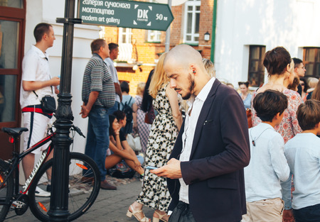 MINSK, BELARUS.August 12, 2017 People watching the performance on the streetのeditorial素材