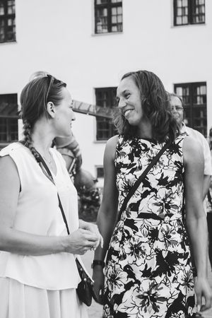 MINSK, BELARUS.August 12, 2017 Two friends are standing on the streetのeditorial素材
