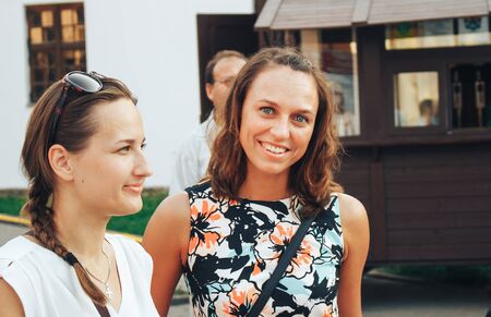 MINSK, BELARUS.August 12, 2017 Two friends are standing on the streetのeditorial素材