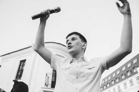 MINSK, BELARUS.August 19, 2017. A man with a microphone on the streetのeditorial素材