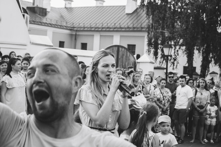 MINSK, BELARUS.August 19 2017 Woman singing on the streetのeditorial素材