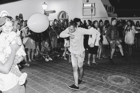 MINSK, BELARUS.August 19, 2017. Group of people laughing and posing in front of cameraのeditorial素材
