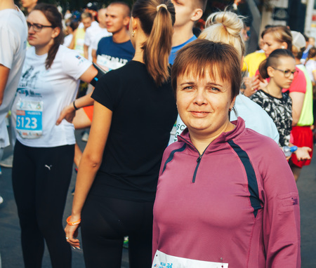 MINSK BELARUS September 10 2017 The woman greets the participantsのeditorial素材