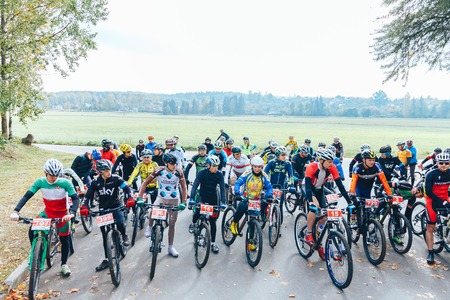 Minsk region Kryzhovka October 8, 2017 Bike ride A group of people on bicycles preparing for the startのeditorial素材