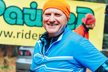 Minsk region Kryzhovka October 8, 2017 Bike ride Elderly man in the woodsのeditorial素材