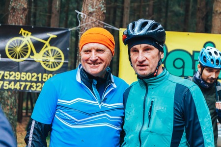 Minsk region Kryzhovka October 8, 2017 Bike ride Two men posing in front of the cameraのeditorial素材