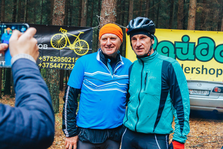Minsk region Kryzhovka October 8, 2017 Bike ride Two men posing in front of the cameraのeditorial素材