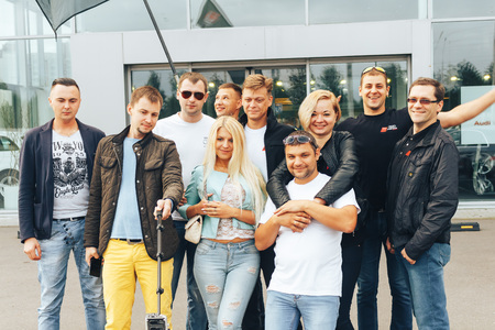 MINSK, BELARUS.August 26, 2017. Test drive audi. Group of people posing in front of the cameraのeditorial素材