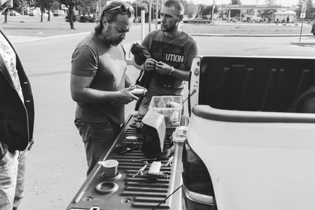 MINSK, BELARUS.August 26, 2017. Test drive audi. Two men stand in the street near the carのeditorial素材