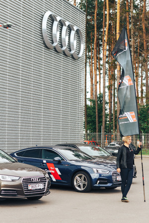 MINSK, BELARUS.August 26, 2017. Test drive audi A girl holding a flagのeditorial素材
