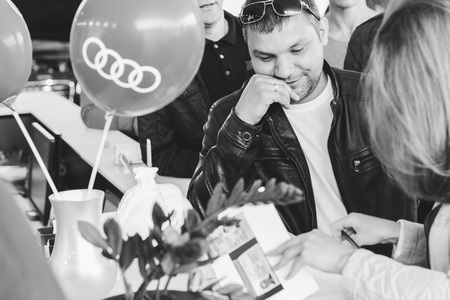 MINSK, BELARUS.August 26, 2017. Test drive audi. A group of people fill out the documentsのeditorial素材