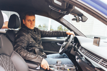 MINSK, BELARUS.August 26, 2017. Test drive audi. A man is sitting in the carのeditorial素材