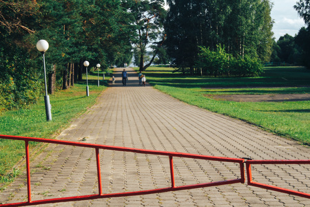 The road is closed by a barrierの写真素材