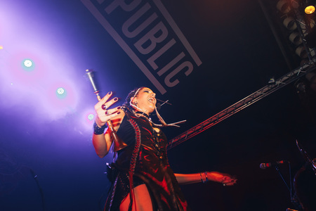 MINSK, BELARUS.September 1 , 2017 Rock band performs in a nightclub The girl shows the performance on stageのeditorial素材