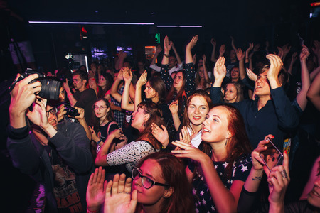 MINSK, BELARUS.September 1 , 2017 Rock band performs in a nightclub A group of people watching a rock band performanceのeditorial素材