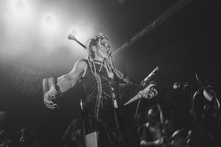 MINSK, BELARUS.September 1 , 2017 Rock band performs in a nightclub The girl shows the performance on stageのeditorial素材